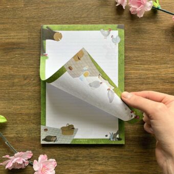 Dubbelzijdig A5 notitieblok met picknick, konijnen en kippen in het park