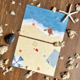 Set van twee postkaarten strand en zee