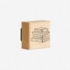 Rubber stempel op houten blokje met boekenstapel afdruk