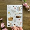 Stickervel met kippen, konijnen, insecten, bloemen en picknick