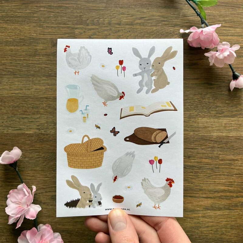 Stickervel met kippen, konijnen, insecten, bloemen en picknick
